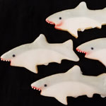 Cut out shark cookies with detail.