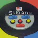 Rolled fondant Simon Says game cake.